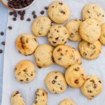 stacks of soft applesauce chocolate chip cookies on parchment paper