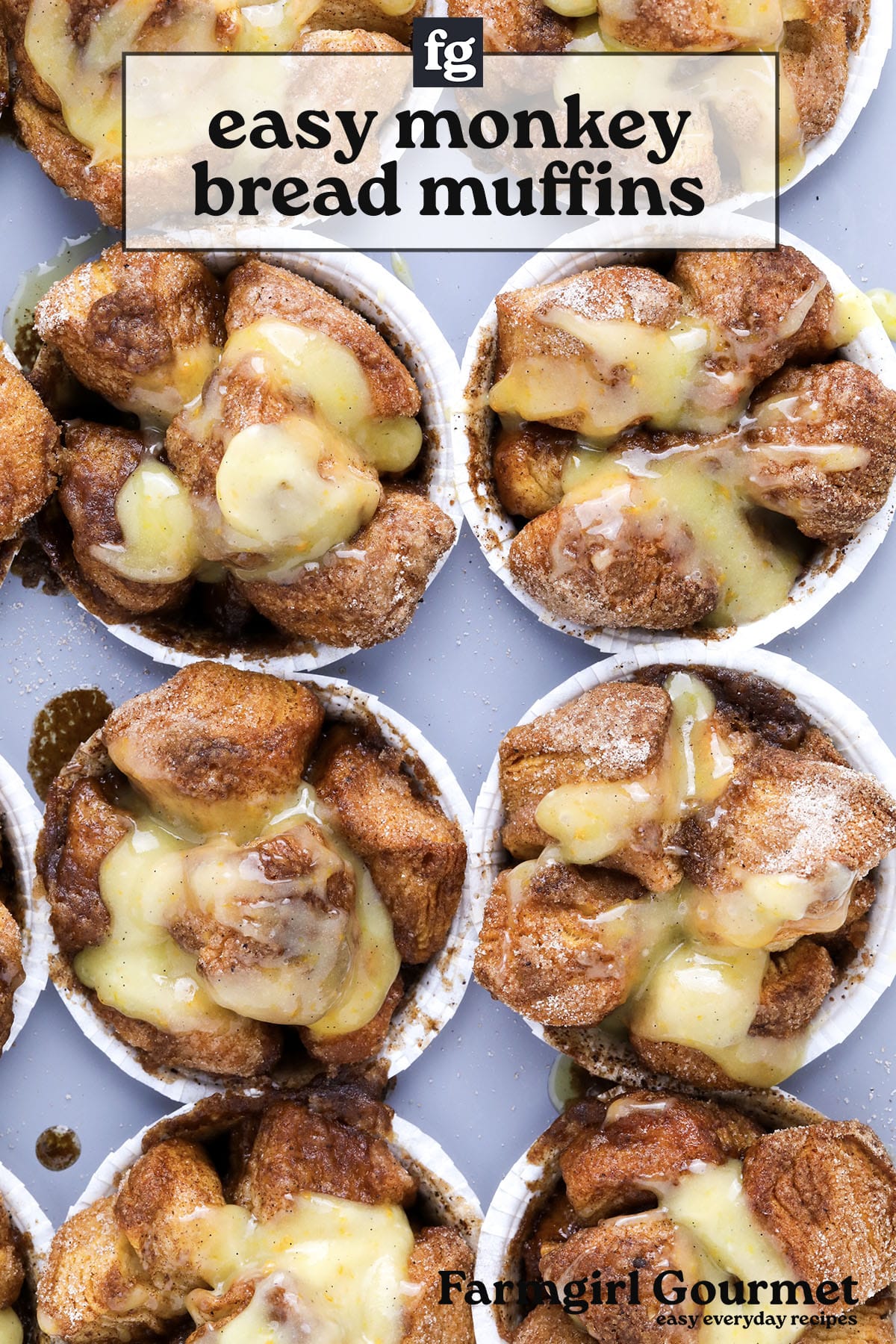 A close-up of golden brown monkey bread muffins in paper liners, topped with a drizzle of icing and coated in cinnamon sugar. Text overlay reads: easy monkey bread muffins.