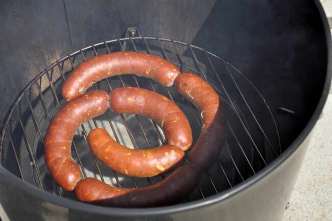smoke homemade linguica links on a traeger or barrel smoker