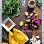 warm potato salad ingredients on a board