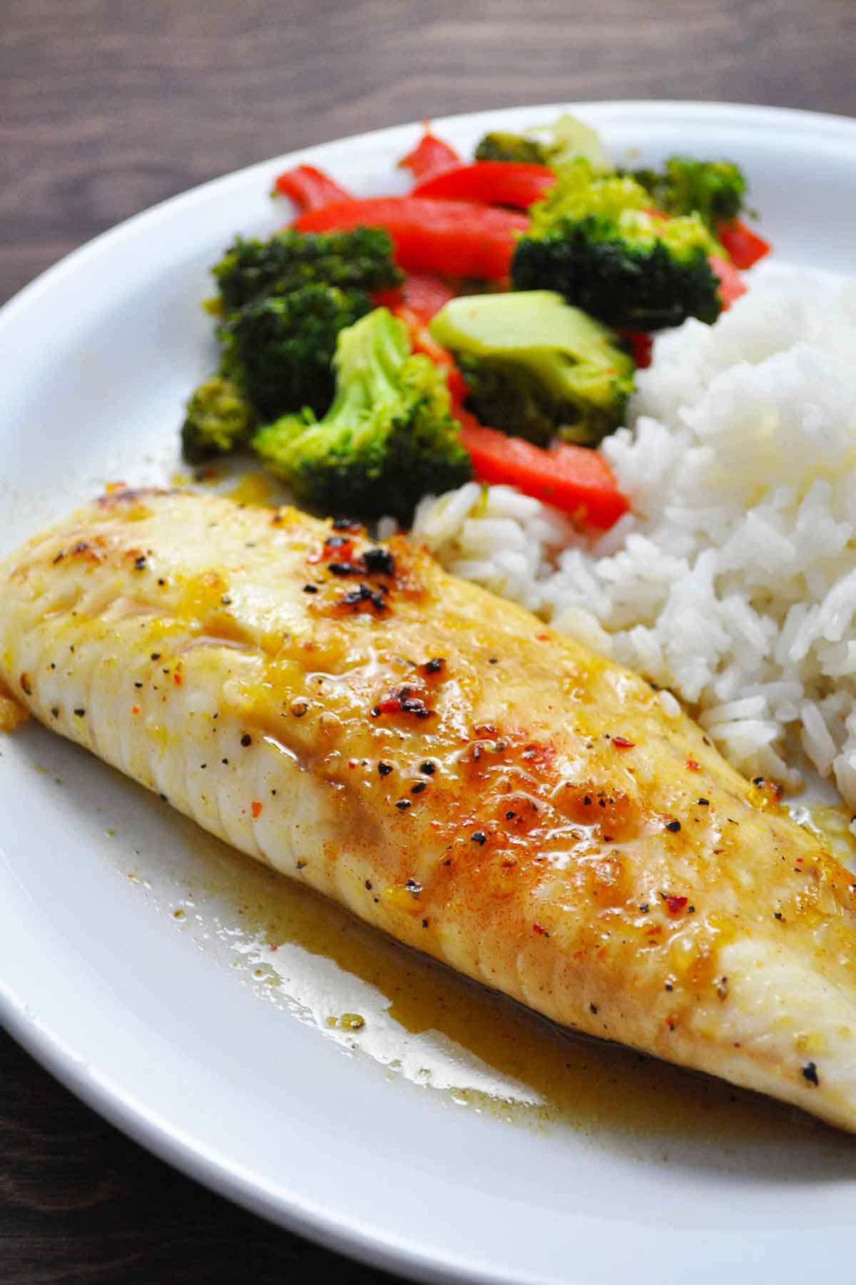 Pan-seared sweet and spicy tilapia fillet topped with glaze