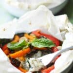 a close up of cod pockets cooked en papillote