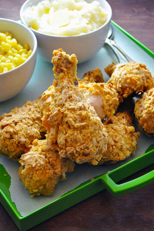 Family-style platter of oven-fried chicken made with potato chips