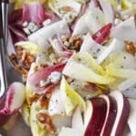 endive salad with pears and blue cheese on a platter