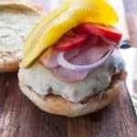closeup of a cuban burger on a bun