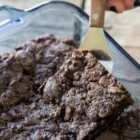 These whole wheat zucchini brownies are not too sweet and perfectly fudgy. Made with freshly grated zucchini, white whole wheat flour and rich chocolate.
