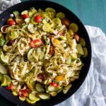 This summer vegetable pesto pasta is the perfect addition to your summer menu. Packed full of fresh garden vegetables, basil pesto and just a pinch of Parmesan cheese.