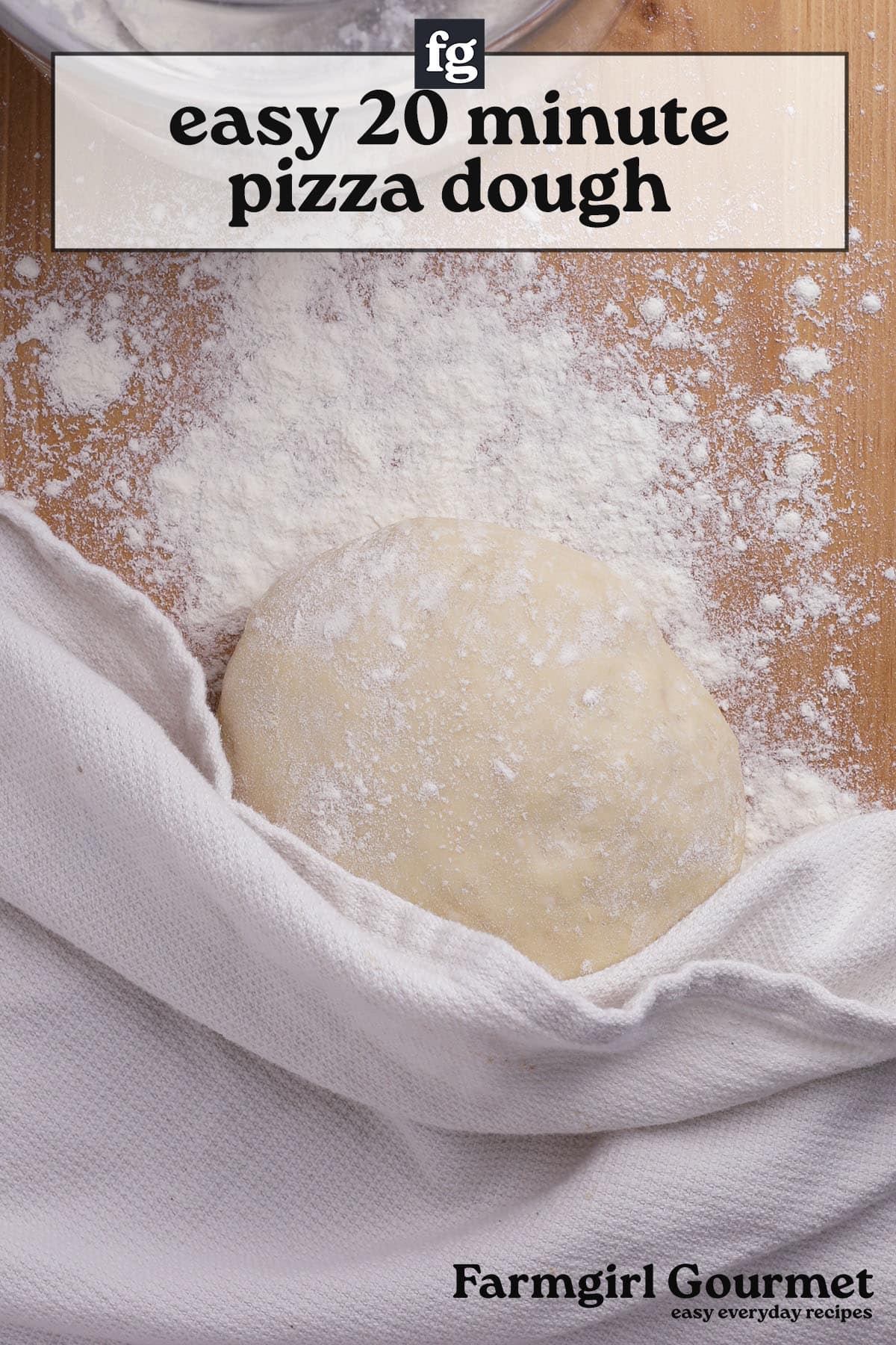 A ball of easy 20 minute pizza dough dusted with flour rests on a wooden surface, partially covered by a white cloth. Text at the top reads easy 20 minute pizza dough, and Farmgirl Gourmet is at the bottom.