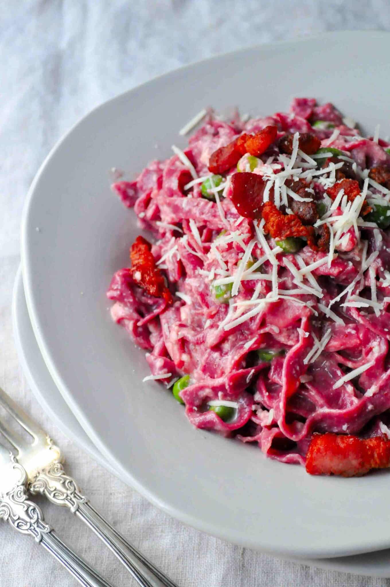 beetroot carbonara with bacon and peas