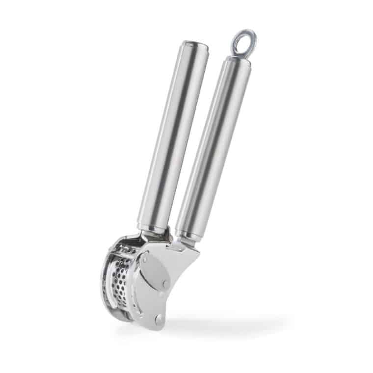 A stainless steel garlic press with two handles and a perforated chamber, designed for crushing garlic cloves, shown standing upright against a white background.