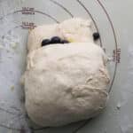 fresh blueberry bread dough rolled up