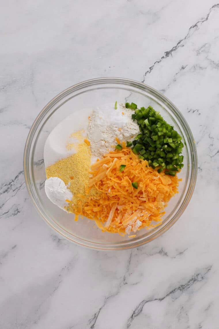top down view of dry cornbread ingredients ready to be stirred together