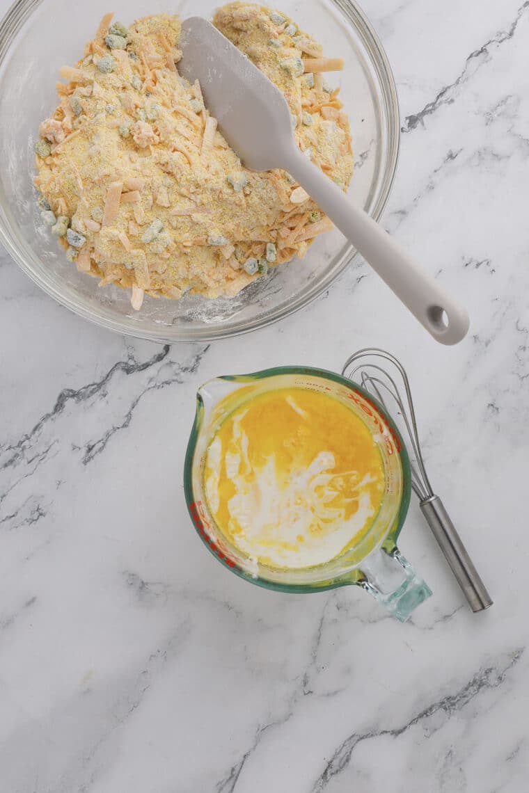 adding buttermilk, butter, and egg to cornbread