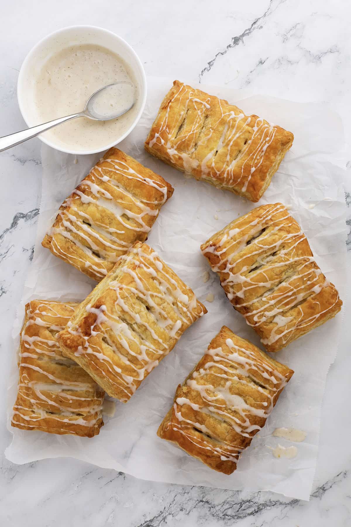 Golden flaky apple turnovers with pumpkin spice filling