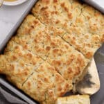 close-up of fluffy butter swim biscuits slided and ready for a drizzle of honey