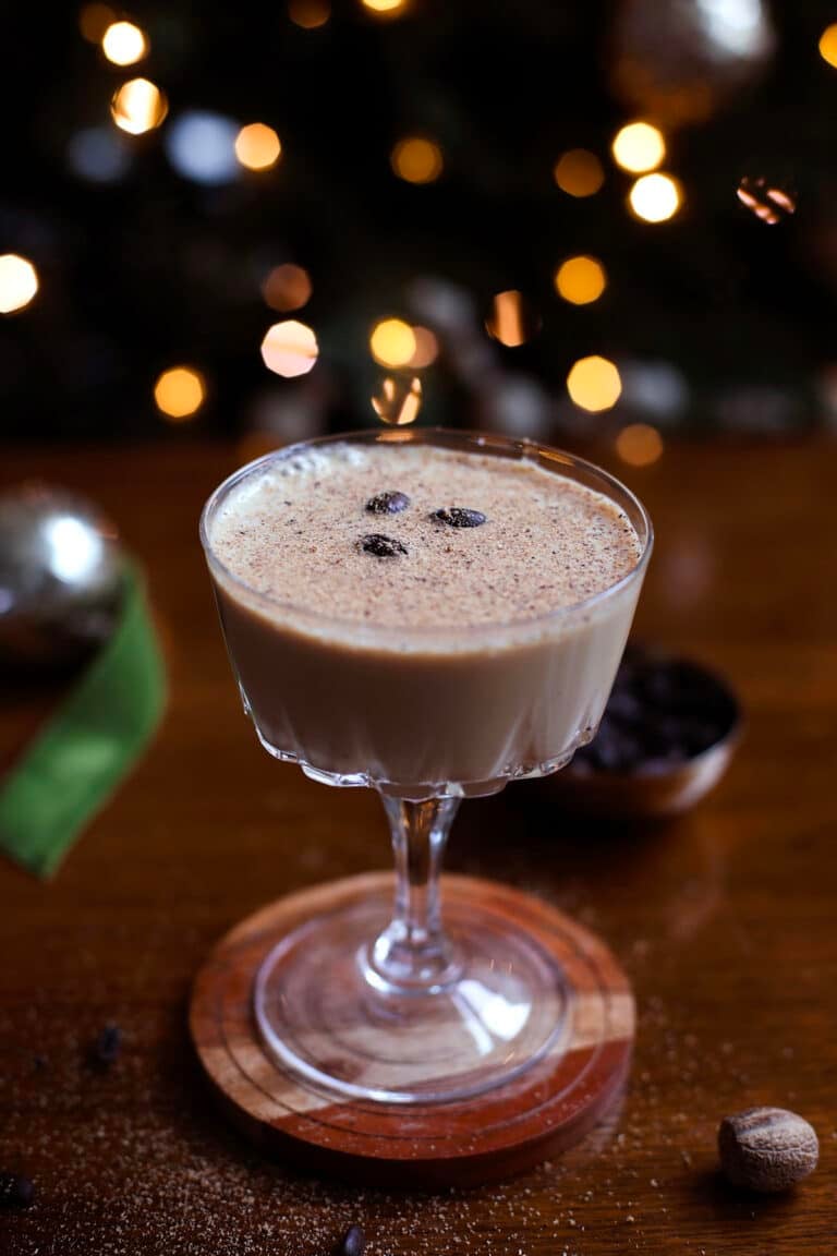 Eggnog espresso martini in coupe glass with nutmeg garnish