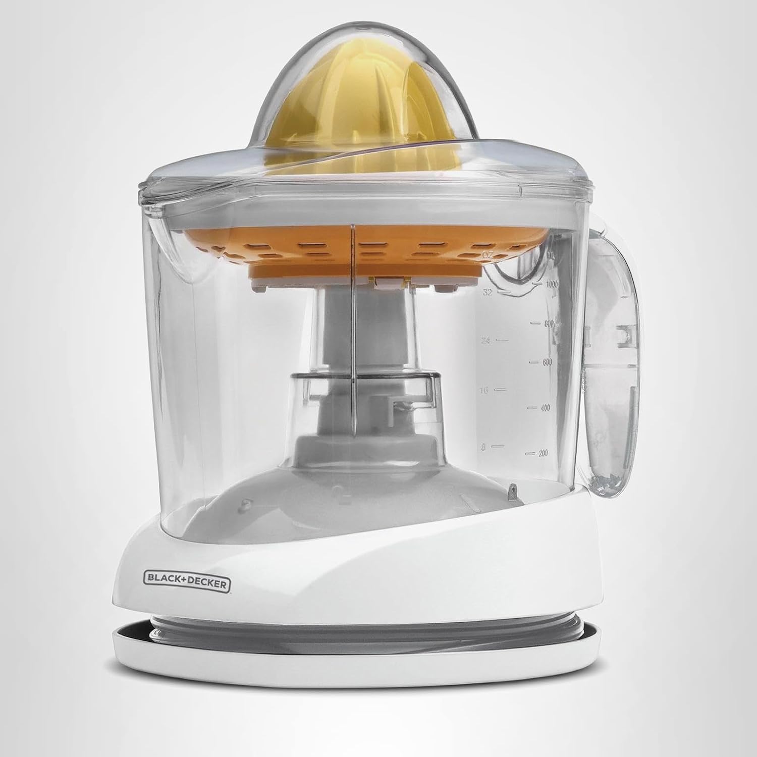 A Black+Decker electric citrus juicer with a transparent container, yellow reamer, clear lid, and built-in handle, shown against a plain white background.