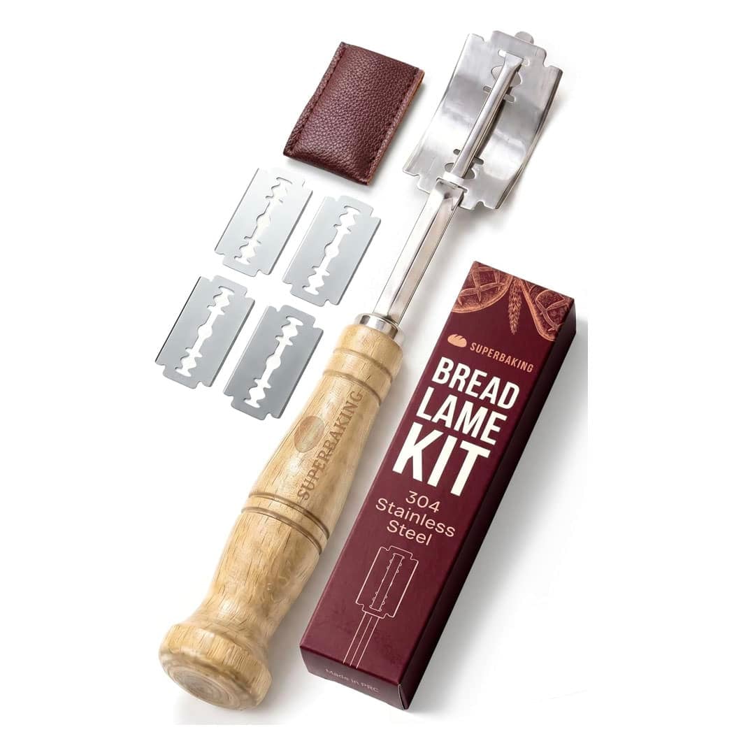A bread lame kit with a wooden-handled tool, five double-edged razor blades, a brown leather cover, and a maroon box labeled “Bread Lame Kit, 304 Stainless Steel”—the perfect addition to your ultimate homemade bread guide.